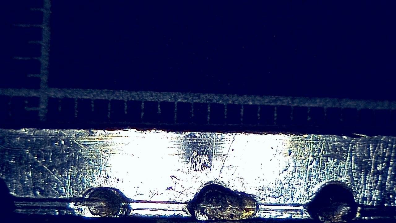 Ispezione forense della superficie Immagine microscopica di esempio 5