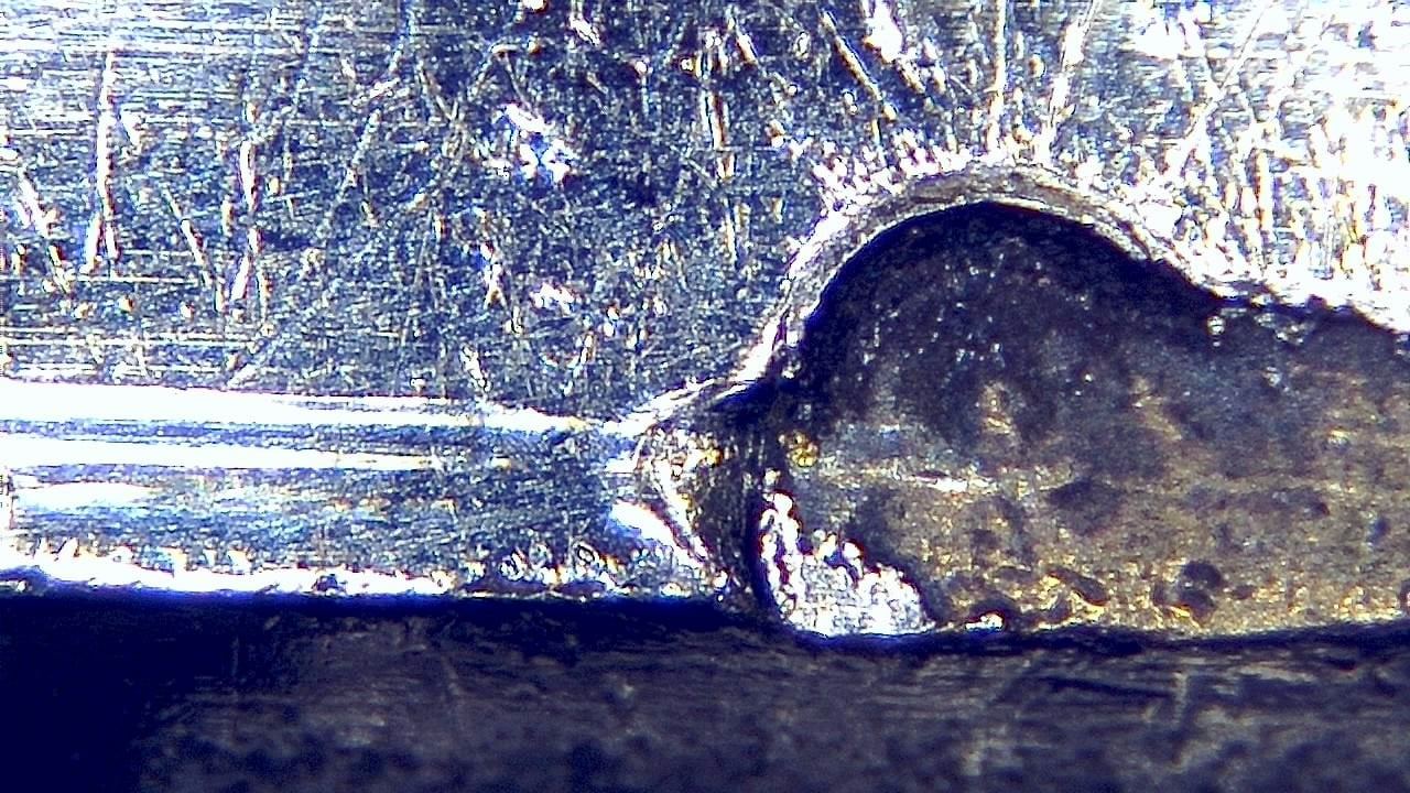 Ispezione forense della superficie Immagine microscopica di esempio 7