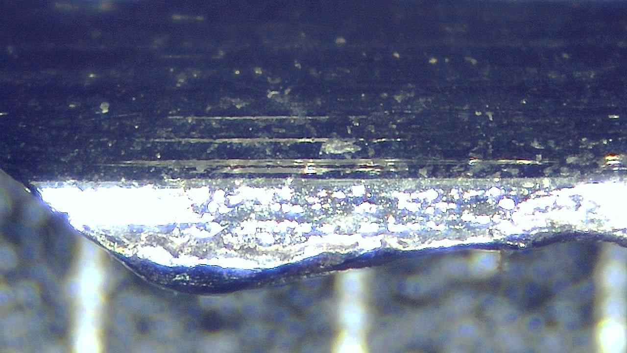 Ispezione forense della superficie Immagine microscopica di esempio 9