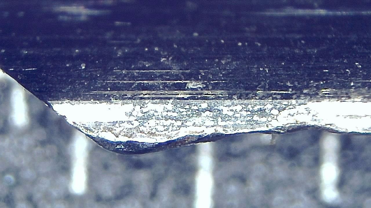 Ispezione forense della superficie Immagine microscopica di esempio 10