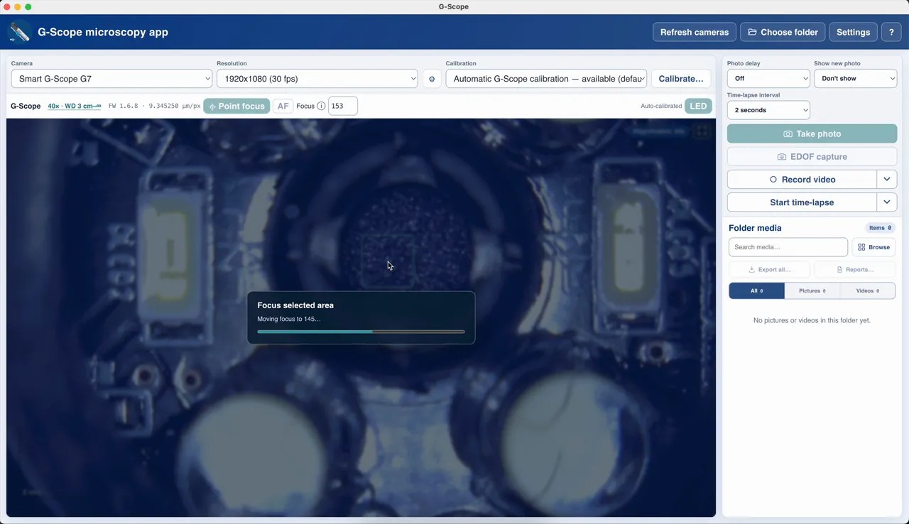 Click-to-focus at higher magnification: focus search on a specimen